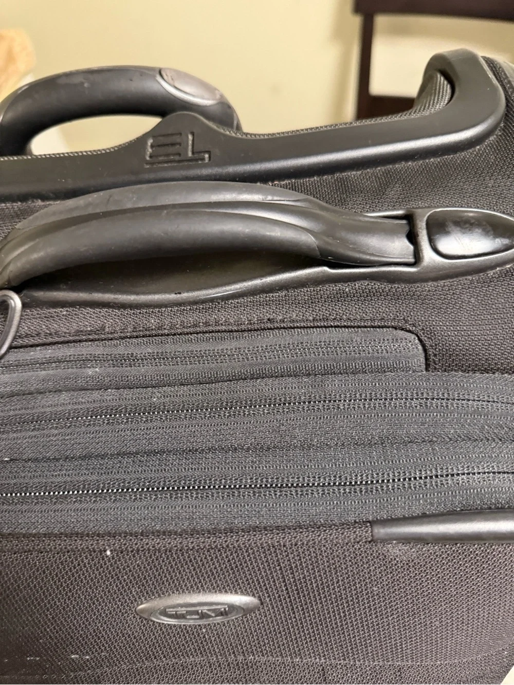 Tumi Black Upright Carry-On Spinner
